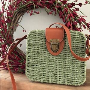 small  straw and vegan leather crossbody